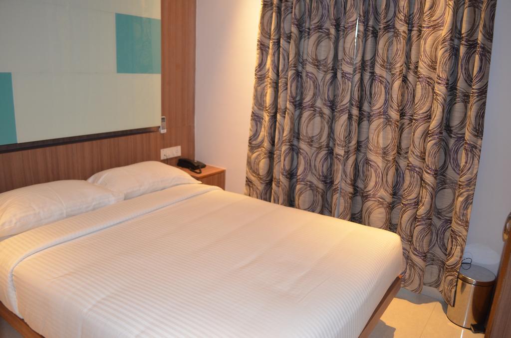 Itsy Hotels Hiland Suites Бангалор Номер фото